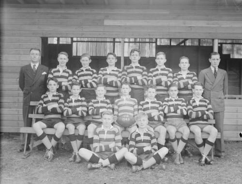 Group portrait of Sydney Grammar School pupils' rugby team 15D and coaches, Sydney, 8 August 1949