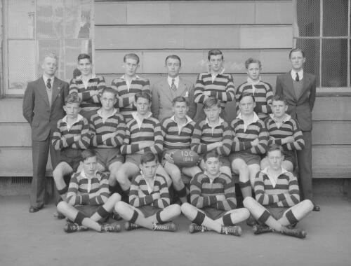 Group portrait of Sydney Grammar School pupils' rugby team and coach on the six groups final day, Sydney, 2 August 1948, 2