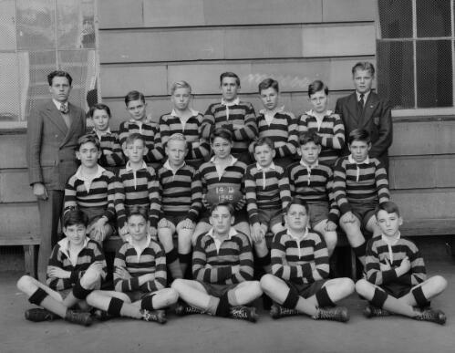 Group portrait of Sydney Grammar School pupils' rugby team and coach, Sydney, 17 August 1948