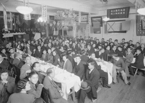 Members of the Chinese Youth Group having a formal dinner, Sydney, New South Wales, October 1943
