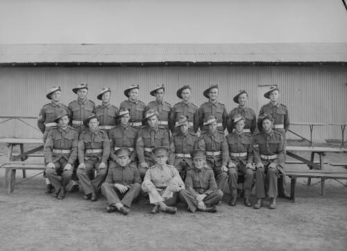 Group portrait of soldiers on the training ground of the School of Artillery, Royal Australian Artillery, Holsworthy, New South Wales, 17 November 1943, 4