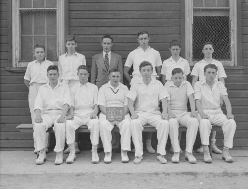 Group portrait of Sydney Grammar School pupils' cricket team and coach, Sydney, 29 October 1948, 4