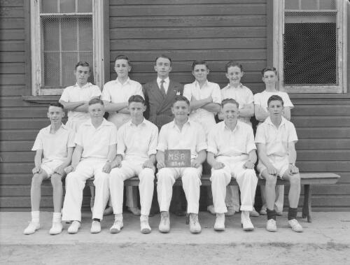 Group portrait of Sydney Grammar School pupils' cricket team and coach, Sydney, 29 October 1948, 8
