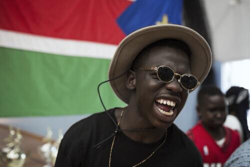 Maluer Malou dancing at the annual National South Sudanese basketball competition, Sydney, 2014 / Conor Ashleigh