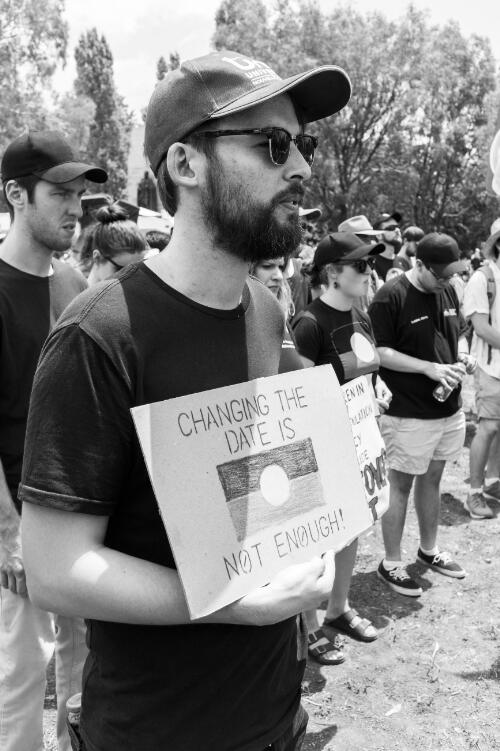 Protestors holding signs during the day of mourning march on Australia Day, Canberra, 26 January 2018, 1 / Sean Davey