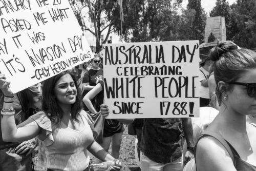 Protestors holding signs during the day of mourning march on Australia Day, Canberra, 26 January 2018, 2 / Sean Davey