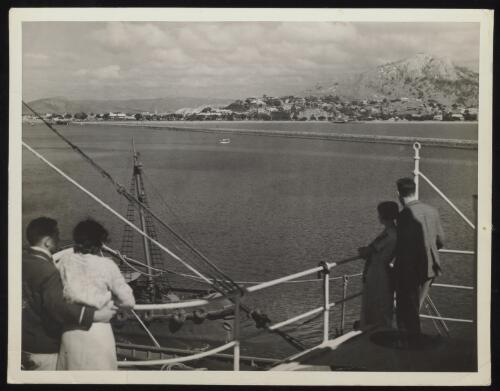 Two couples aboard a ship approaching Townsville, Queensland, approximately 1937