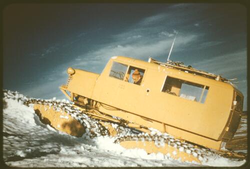A snowcat clearing snow, Snowy Mountains Hydro-Electric Scheme, Snowy Mountains, New South Wales, approximately 1955