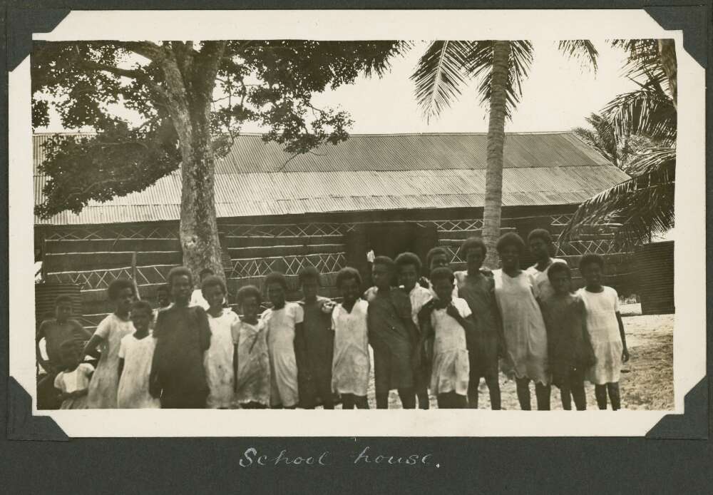 Group of school children stand out the front of the school on Badu Island, Queensland, ca. 1928