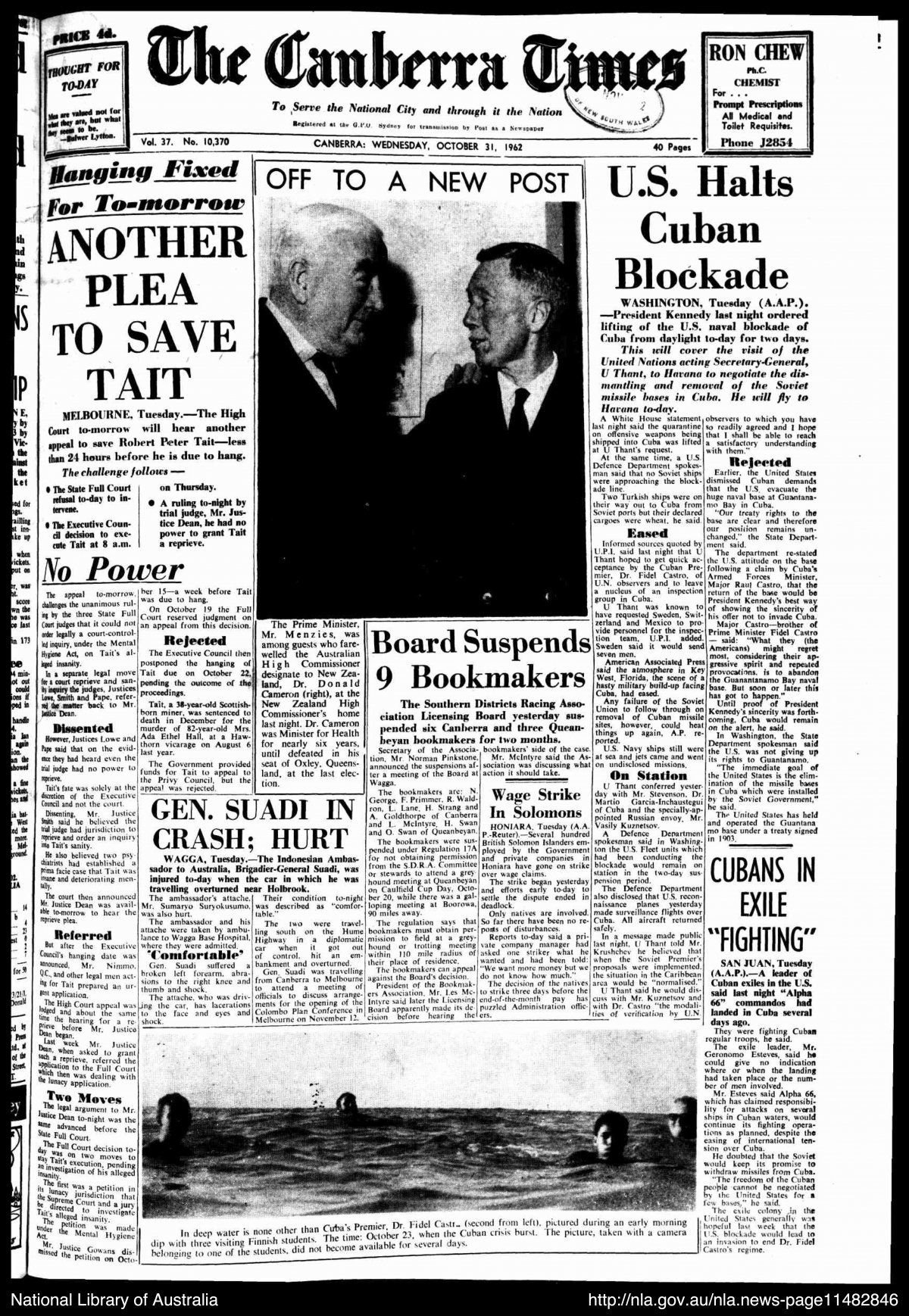 The front page of The Canberra Times newspaper. Several headlines scatter the page. One reads "U.S. Halts Cuban Blockade". There is a black and white photograph of Prime Minister Menzies shaking hands with Donald Cameron, High Commissioner to New Zealand